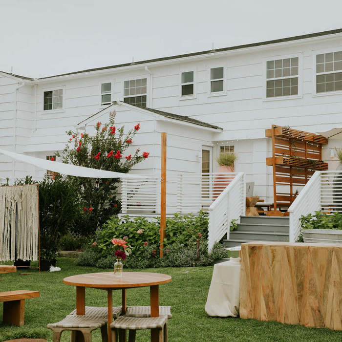 Large thumb a large white colonial house with garden